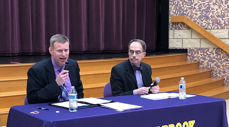 Bellbrook schools Superintendent Doug Cozad (left) and David Carpenter answer residents’ school levy questions at a community meeting Monday, Feb. 3, 2020 at Bellbrook Middle School. JEREMY P. KELLEY / STAFF