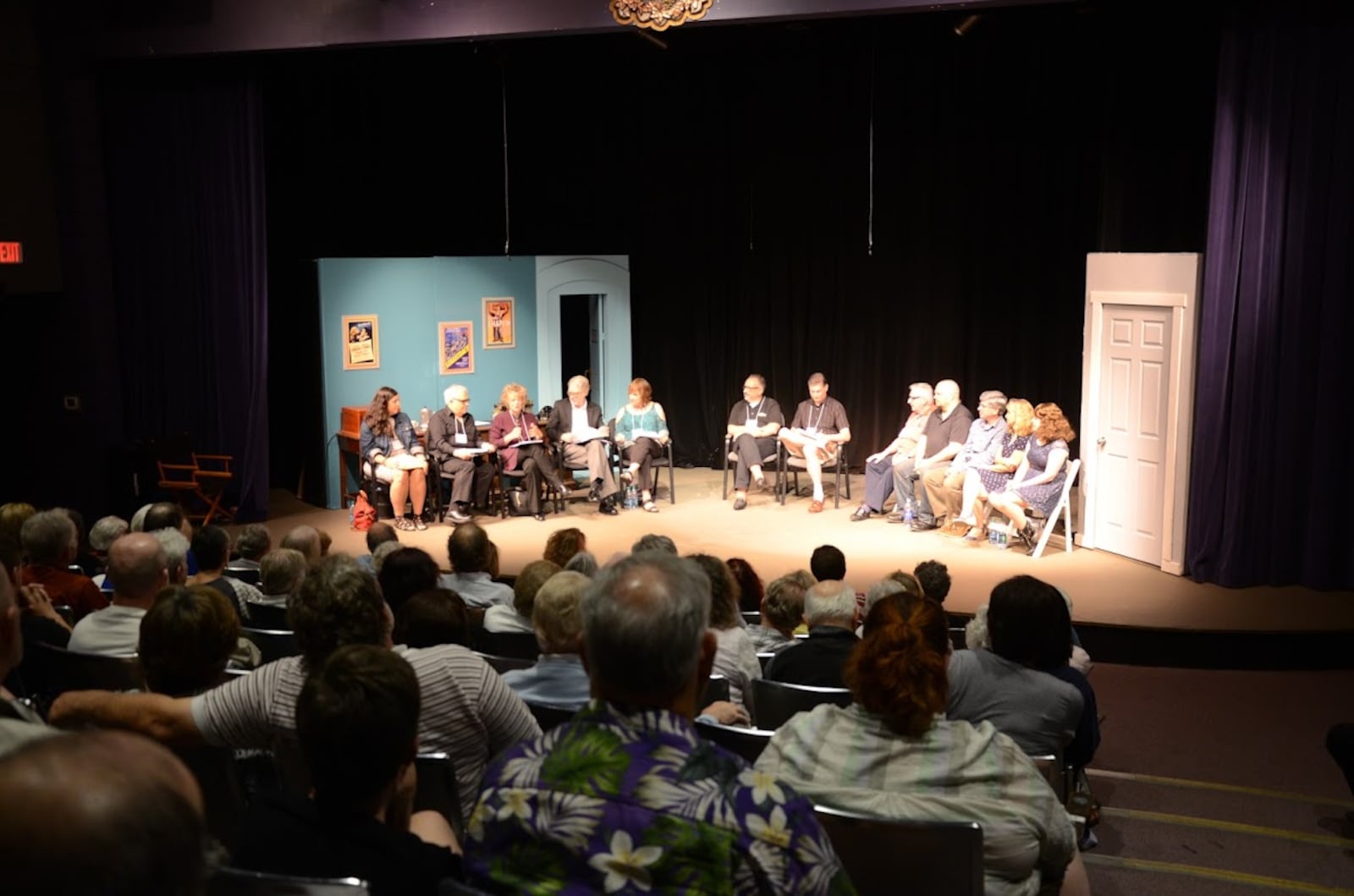 This formula makes FutureFest special. A group of judges (pictured left onstage); a playwright explaining the play (center), actors and director who bring the script to life (pictured right onstage); and an engaged audience. Contributed.