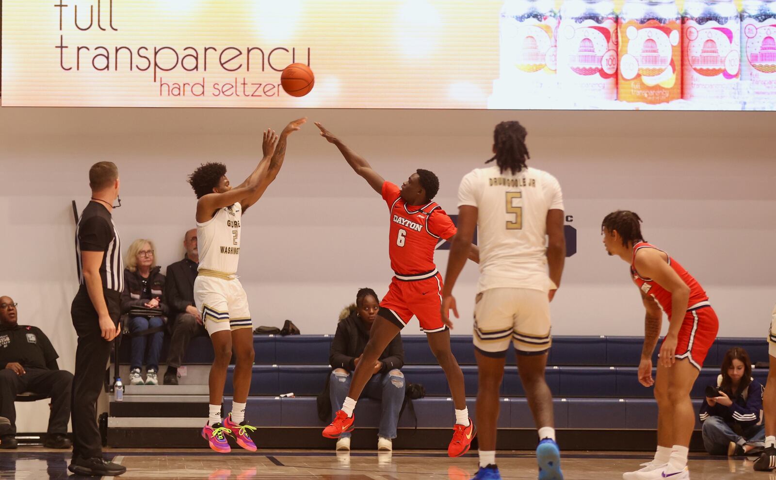 George Washington's Christian Jones makes a 3-pointer against Dayton on Saturday, Jan. 4, 2025, at the Charles E. Smith Center in Washington, D.C. David Jablonski/Staff