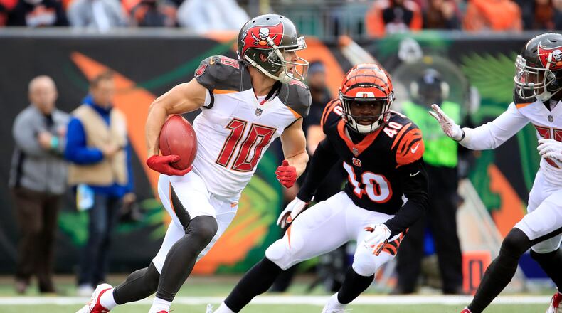 CINCINNATI, OH - OCTOBER 28: Adam Humphries #10 of the Tampa Bay Buccaneers runs the ball past Brandon Wilson #40 of the Cincinnati Bengals during the first quarter at Paul Brown Stadium on October 28, 2018 in Cincinnati, Ohio. (Photo by Andy Lyons/Getty Images)