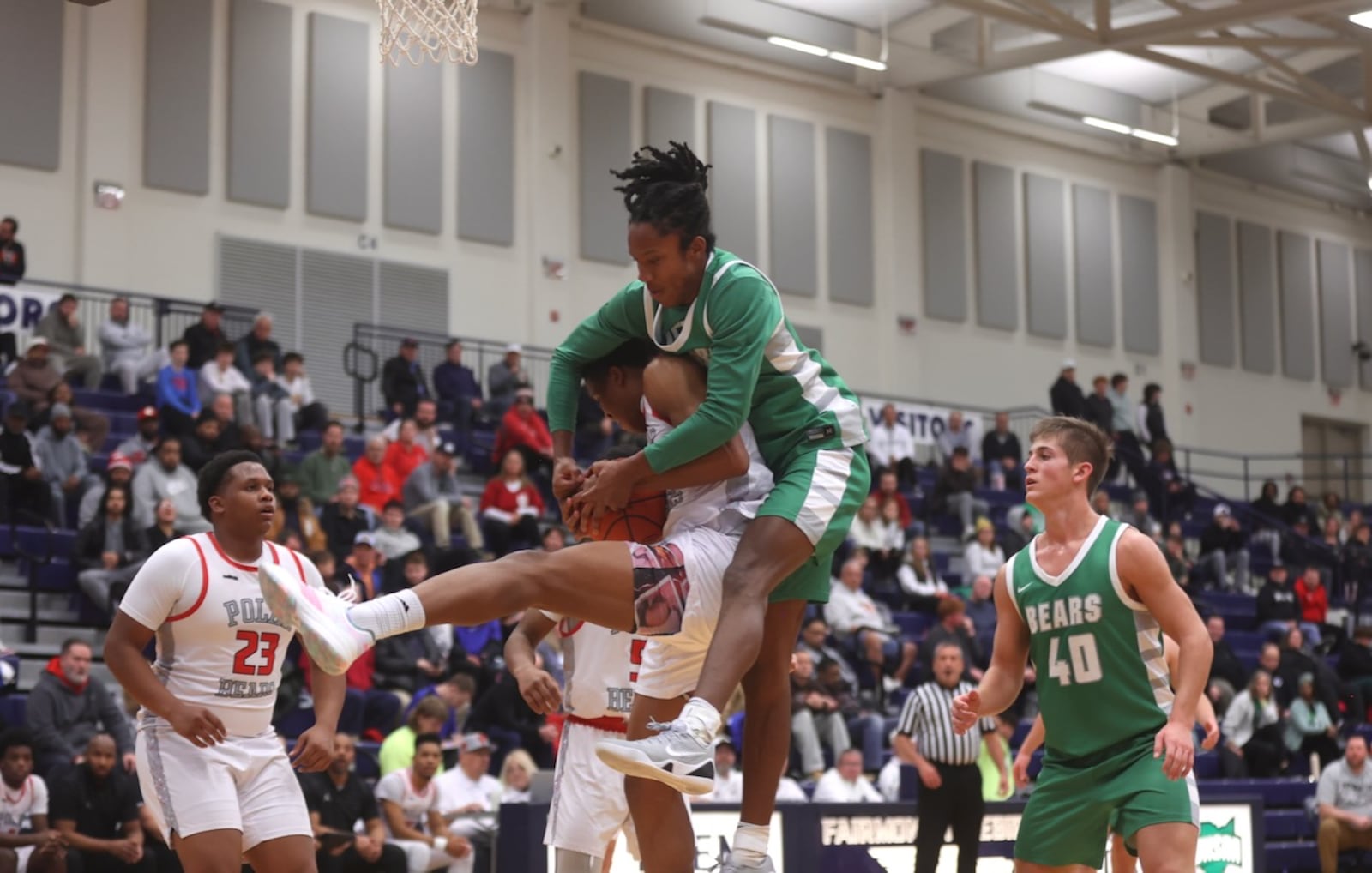 Dayton recruit Julian Washington, of Margaretta, tries to grab a rebound against Northridge's Keonte Smith at the Beacon Orthopaedics Flyin’ To The Hoop on Monday, Jan. 19, 2026, at Trent Arena in Kettering. David Jablonski/Staff