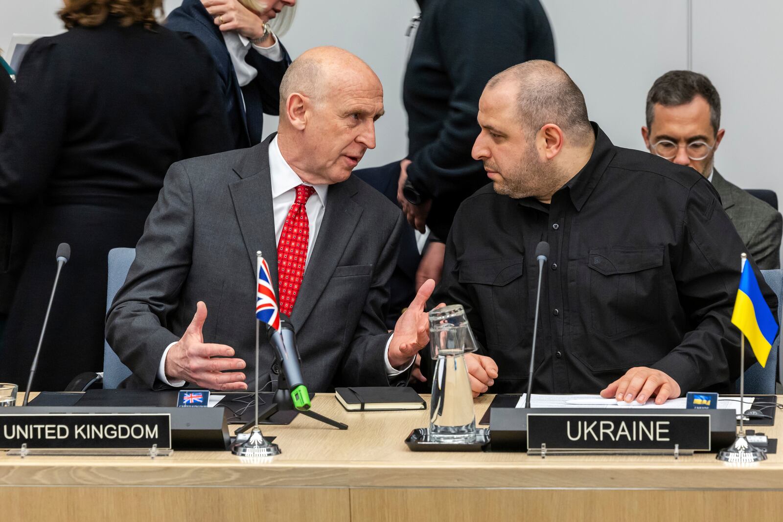 Britain's Defense Secretary John Healey, left, talks with Ukraine's Defense Minister Rustem Umerov during a meeting of the Ukraine Defence Contact Group at NATO headquarters in Brussels, Friday, April 11, 2025. (AP Photo/Geert Vanden Wijngaert)