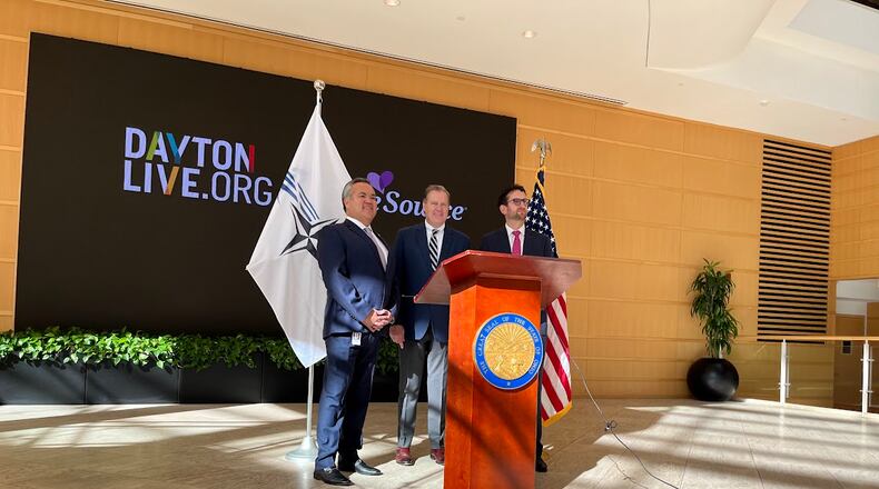 U.S. Rep. Mike Turner, R-Dayton, center, after discussing plans Wednesday for next May's expected NATO Spring Parliamentary Assembly visit to Dayton. On Turner's right: Erhardt Preitauer, president and CEO of CareSource. On his left, Gabriel van Aalst, president and CEO of Dayton Live. THOMAS GNAU/STAFF