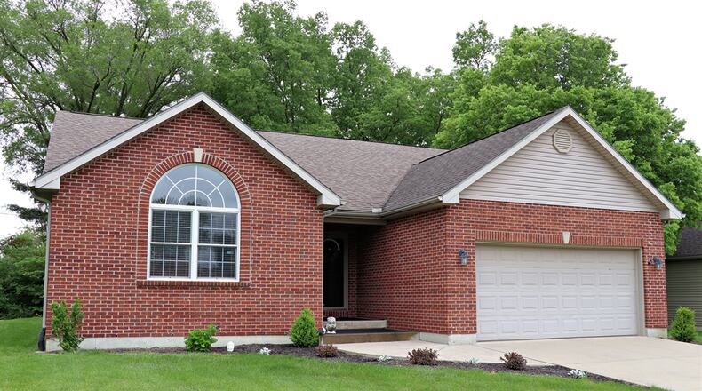 Listed for $354,900, the brick house at 1201 Hawks Nest Drive in Troy has about 1,876 square feet of living space. KATHY TYLER / CONTRIBUTED PHOTOS