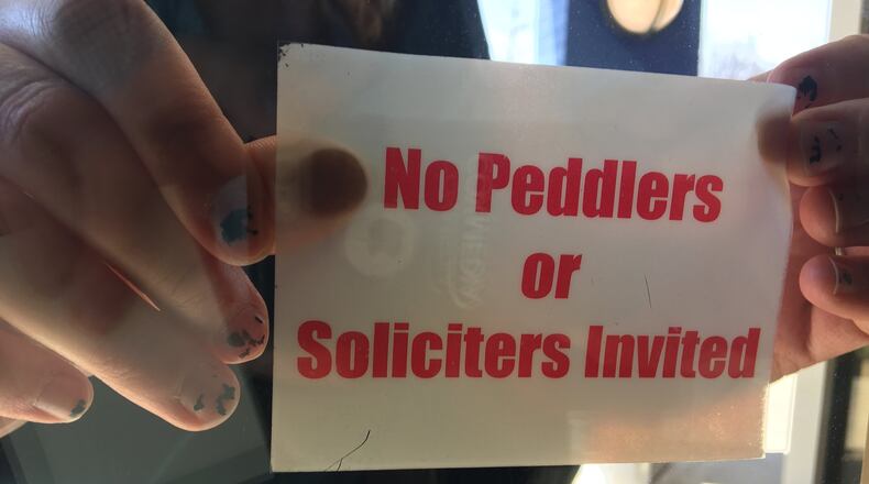 As spring nears, area leaders are expecting solicitors to come into their communities. Miamisburg provides residents these no soliciting stickers. STAFF PHOTO / MAX FILBY