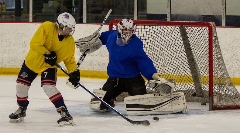 The Dayton Stealth hockey team made up of players from 12 Dayton area high schools practiced for the final time Tuesday at Chiller Ice Rink in Springfield before leaving Wednesday for a national tournament in Minnesota. CONTRIBUTED/Jeff Gilbert