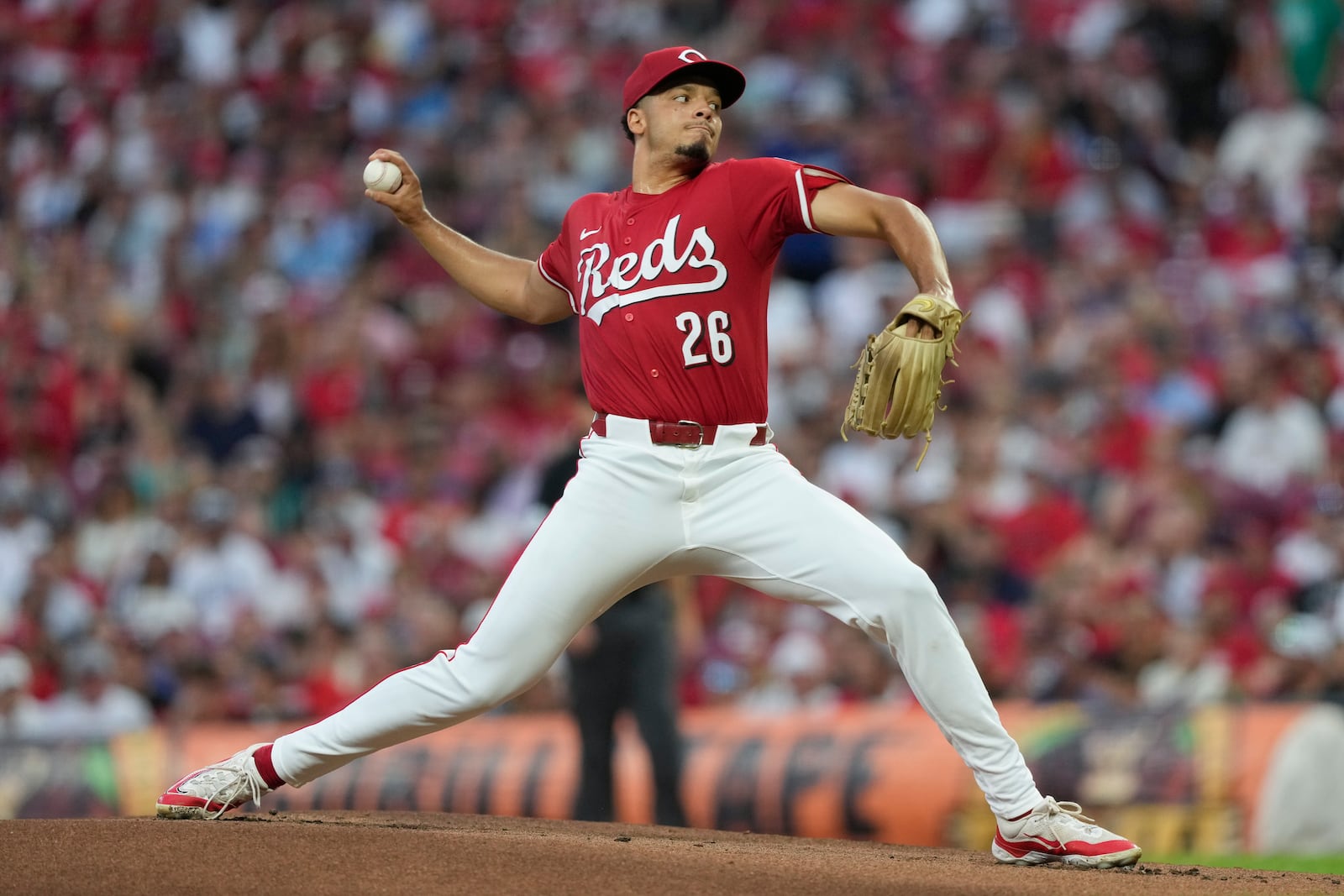 Cincinnati Reds pitcher Chase Burns throws during the first inning of a baseball game against the Los Angeles Dodgers, Monday, July 28, 2025, in Cincinnati. (AP Photo/Carolyn Kaster)