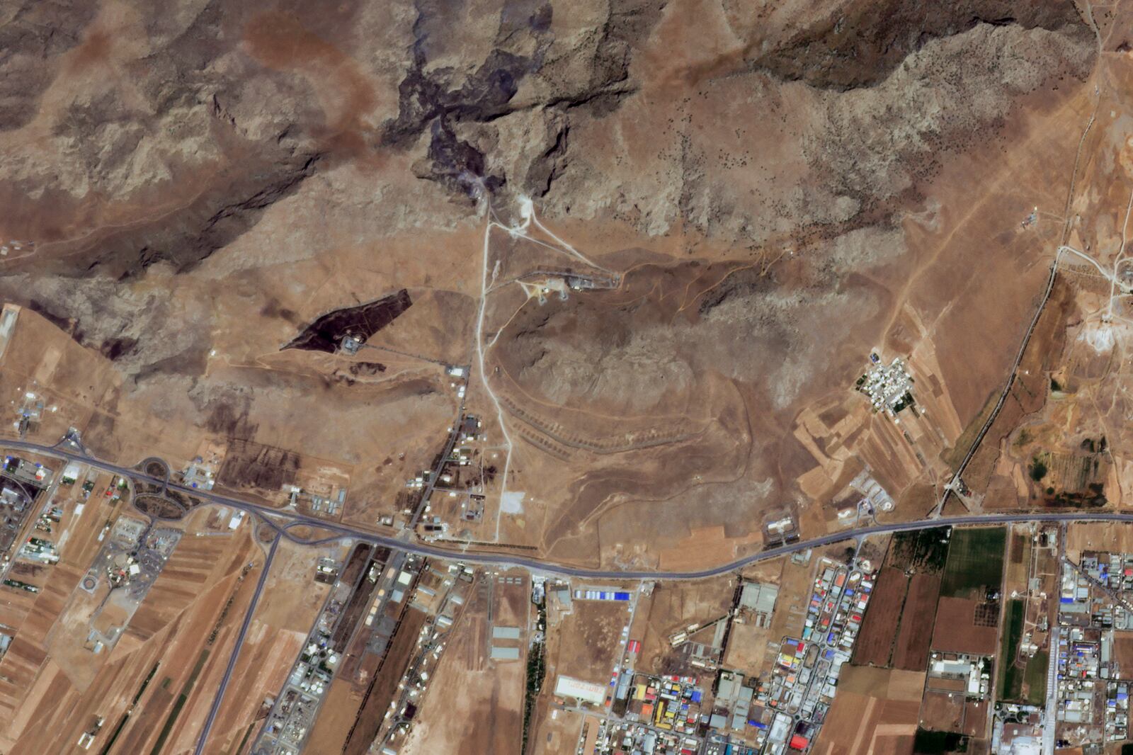 This satellite image from Planet Labs PBC shows an Iranian missile base near Kermanshah, Iran, after an Israeli strike Friday, June 13, 2025. (Planet Labs PBC via AP)