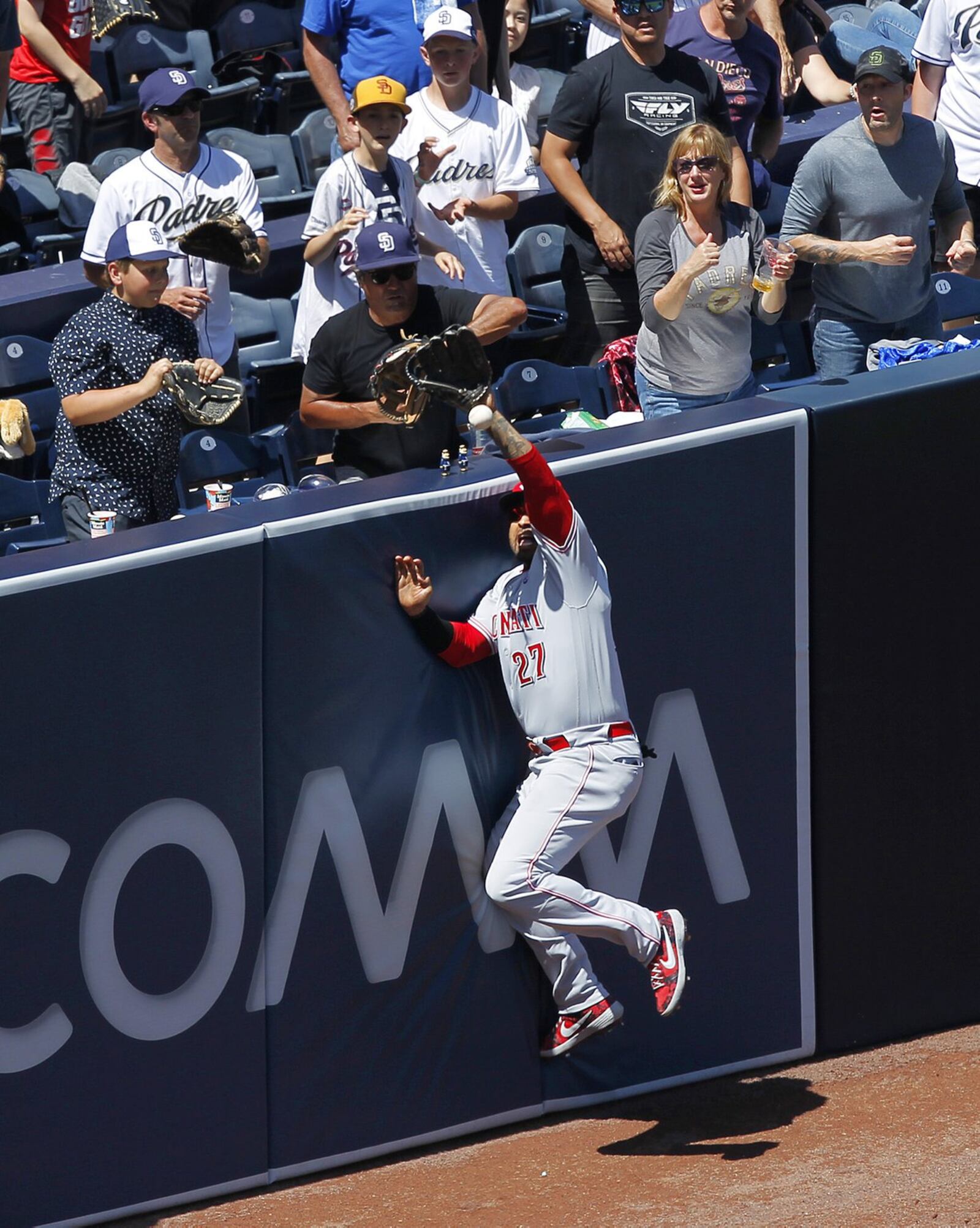 Reds left fielder Matt Kemp can’t make a catch on a two-run double by San Diego Padres’ Wil Myers in the third inning on Sunday, April 21, 2019 at Petco Park in San Diego, Calif. (K.C. Alfred/San Diego Union-Tribune/TNS)