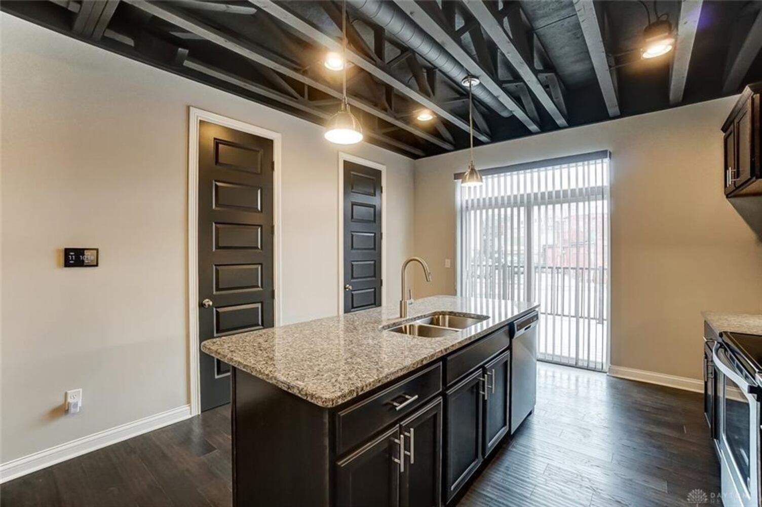 PHOTOS: Downtown Dayton condo with rooftop patio listed for nearly $500K