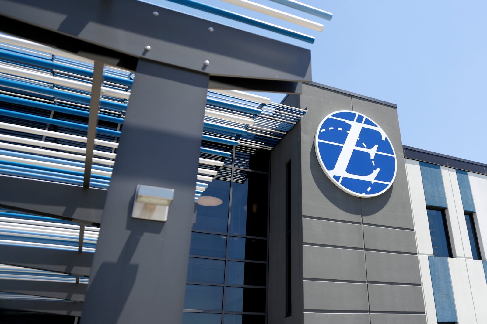 FILE - An exterior look of the Express Scripts mail-in pharmacy warehouse, Tuesday, July 10, 2018, in Florence, N.J. (AP Photo/Julio Cortez,File)