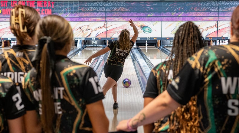 The Wright State University women's bowling team watches as one of their teammates rolls the ball down the lane during the Raider Classic last November at Beaver-Vu Bowl in Beavercreek. WRIGHT STATE ATHLETICS / CONTRIBUTED PHOTO