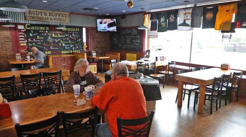 Rita Dornon and her husband, Frank, enjoyed lunch at Rudy’s Smokehouse in Springfield Thursday. Area restaurants were permitted to reopen dinning rooms Thursday as long as they followed social distancing guidelines. BILL LACKEY / STAFF