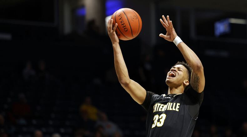 Centerville's Jonathan Powell goes to the hoop during their Division I regional semifinal basketball game Wednesday, March 13, 2024 at Xavier University's Cintas Center. Centerville won 60-35. NICK GRAHAM/STAFF