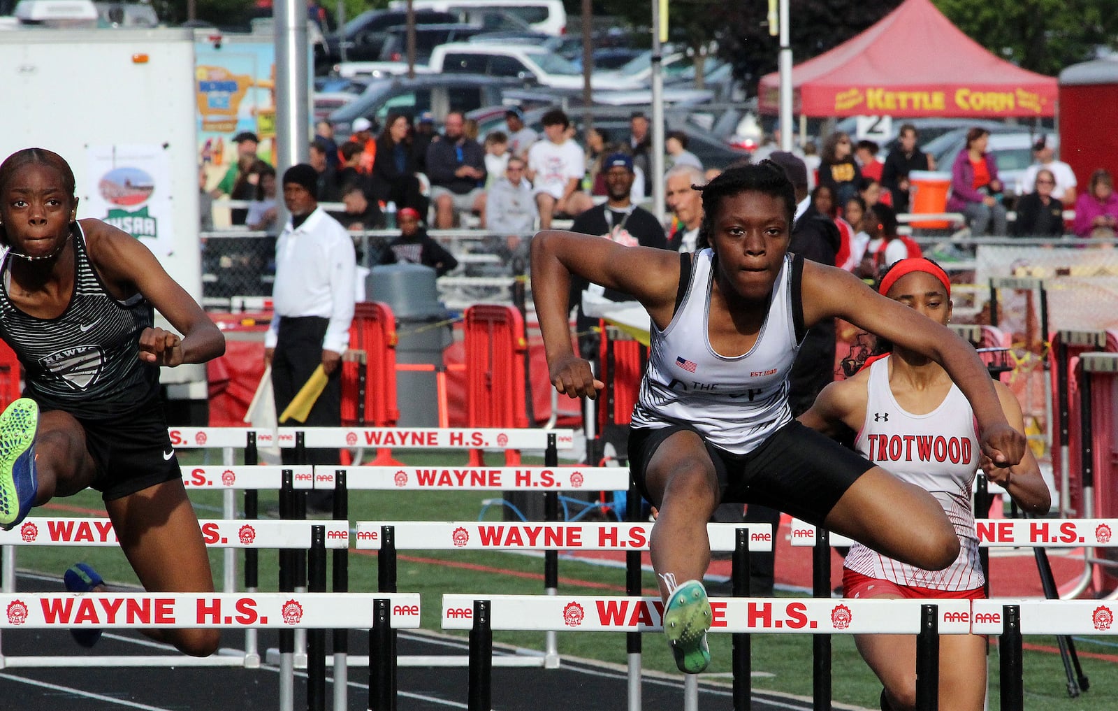 Beavercreek's Faith Brown clears the hurdle during the 100 hurdles during the Division I Region 4 track finals at Wayne's Heidkamp Stadium. HENRY S. CONTE / CONTRIBUTED PHOTO