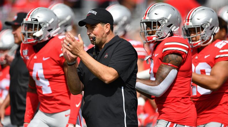 COLUMBUS, OH - SEPTEMBER 7: Head Coach Ryan Day of the Ohio State Buckeyes watches his team warm up before a game against the Cincinnati Bearcats at Ohio Stadium on September 7, 2019 in Columbus, Ohio. (Photo by Jamie Sabau/Getty Images)