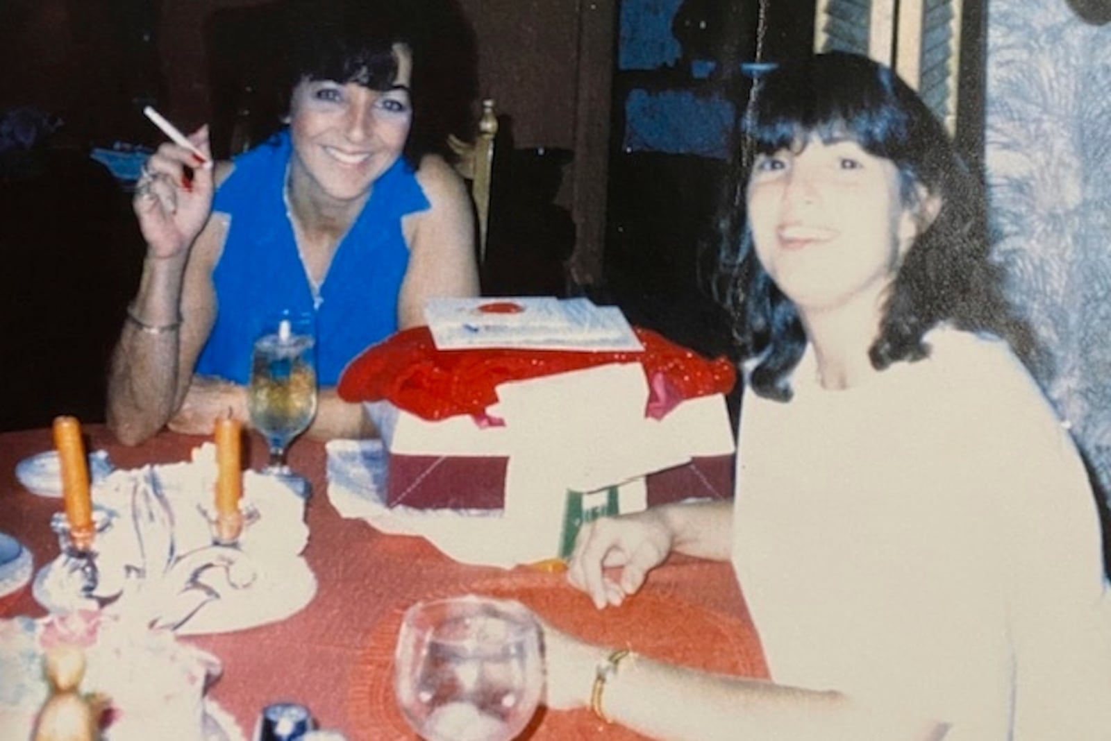 This undated photo released by Maria David shows her sister, Carmen Gayheart, posing with their mother, Joanne Tortora. (Maria David via AP)