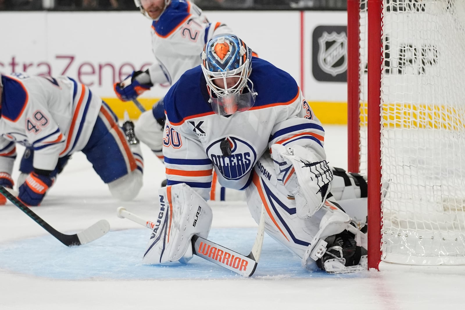 Edmonton Oilers goaltender Calvin Pickard (30) makes a save against the Vegas Golden Knights during the second period of Game 2 of a second-round NHL hockey playoff series Thursday, May 8, 2025, in Las Vegas. (AP Photo/John Locher)