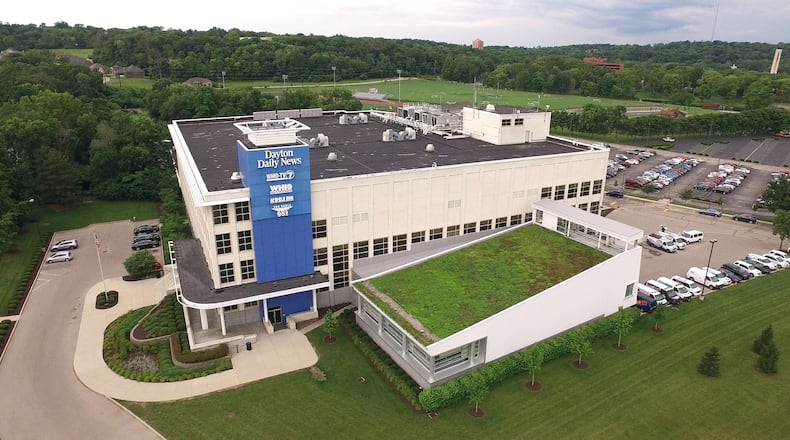 The Cox Media Group Ohio building is a former NCR building. NCR is moving into its second headquarters building located in Atlanta since leaving Dayton in 2009. TY GREENLEES / STAFF