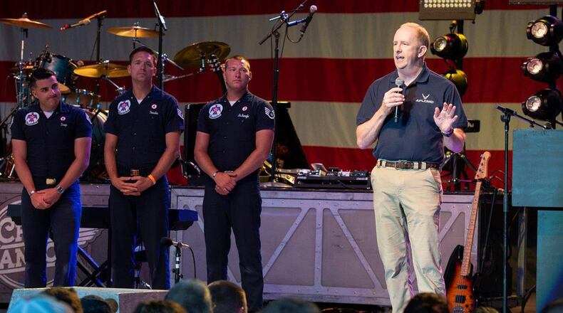 Lt. Gen. Robert McMurry Jr., Air Force Life Cycle Management Center commander, delivers remarks during the military appreciation night at the Fraze Pavilion June 20. Fans later heard from the concert headliner, Chris Janson. (U.S. Air Force photo/Wesley Farnsworth)