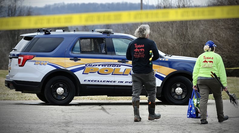 The Ohio chapter of Texas EquuSearch urban search and recovery team was assisting Trotwood police after suspect human remains were found on Covenant House Drive Tuesday, March 8, 2022. MARSHALL GORBY / STAFF