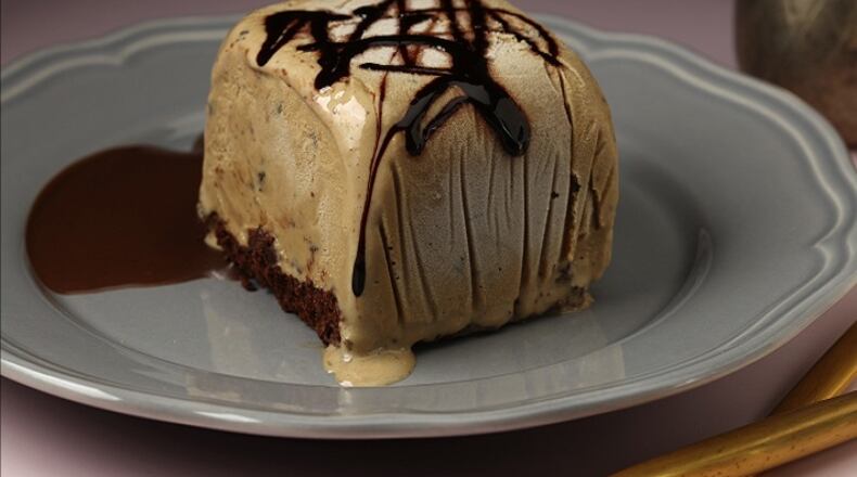 The cake-and-ice-cream squares are built on a base of chocolate cake, flavored with coffee, and are topped with coffee chip ice cream. Your favorite chocolate sauce finishes the treat. (Joan Moravek/food styling) (E. Jason Wambsgans/Chicago Tribune/TNS)
