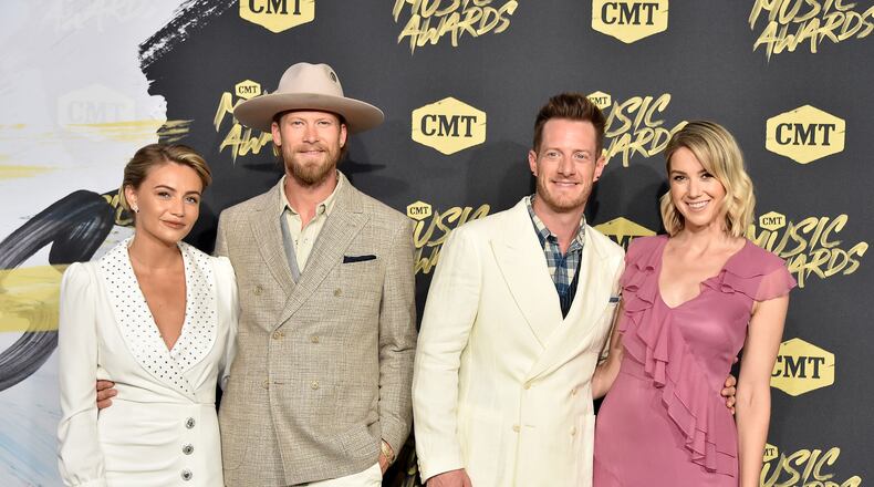 NASHVILLE, TN - JUNE 06: Brittney Marie Kelley, Brian Kelley and Tyler Hubbard of Florida Georgia Line, and Hayley Hubbard attend the 2018 CMT Music Awards at Bridgestone Arena on June 6, 2018 in Nashville, Tennessee. (Photo by Mike Coppola/Getty Images for CMT)