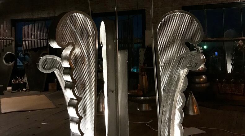 The side pieces of Michael Bashaw's latest sculpture assembled in his studio. The side fiddlehead ferns stand at 7 feet tall and the center piece is over 18 feet tall. CONTRIBUTED