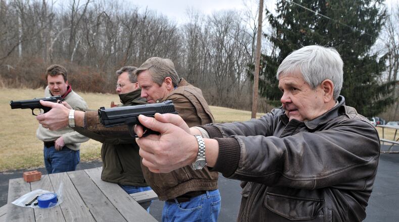 State Rep. Ron Maag, R-Salem Twp., (front) this week introduced two bills, both aimed at easing restrictions on licensed gun owners.