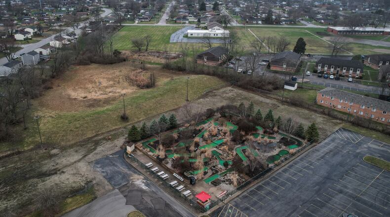 The Englewood Fun Center on South Main in Englewood wants to build a go kart track along the back side of their mini-golf area. This aerial shows the mini-golf, in the center, surrounded by vacant land, apartments and houses. JIM NOELKER/STAFF