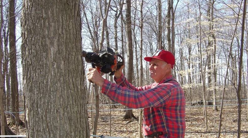 William Dean Dohner, a 2nd Street Market founding vendor. died on Sunday, Dec. 11 at the age of 89. Dohner is seen here tapping maple trees on his farm around 1990. CONTRIBUTED