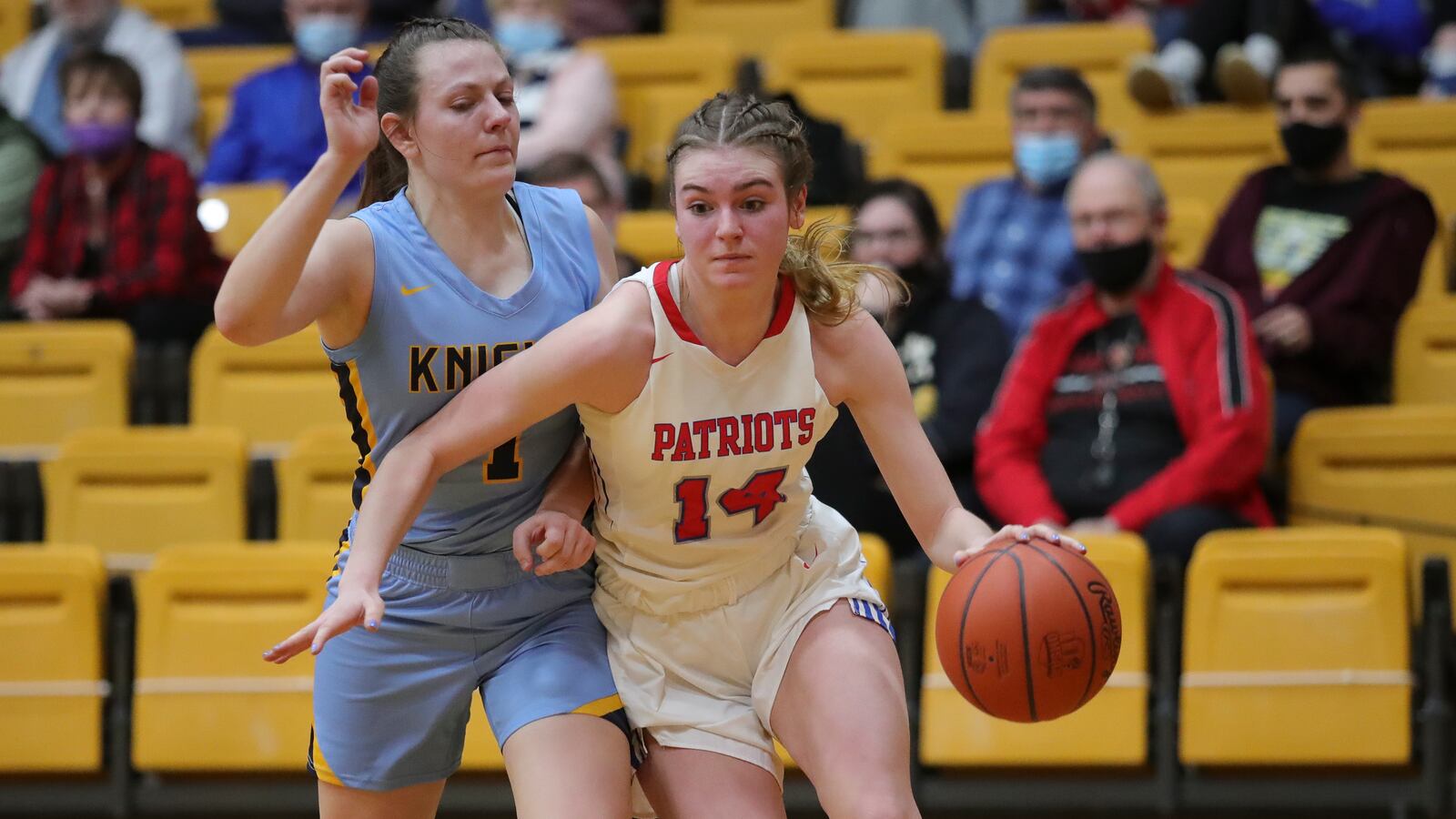 Tri-Village High School's Morgan Hunt drives past Legacy Christian's Kathleen Ahner during their game on Thursday night at the Vandalia Butler Student Activity Center. The Patriots won 53-42. Michael Cooper/CONTRIBUTED