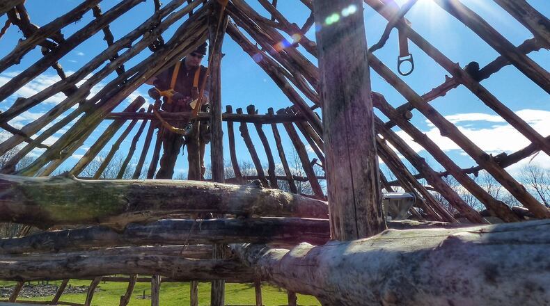 Bill Kennedy, an archaeologist and the curator of Anthropology at the Dayton Society of Natural History, is re-framing the Big House at SunWatch Indian Village/Archaeological Park. The re-framing will take him approximately 2,000 hours to complete. CONNIE POST / STAFF