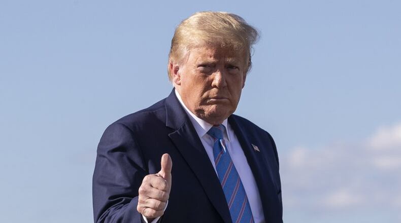 FILE - In this Sunday, June 14, 2020 file photo, President Donald Trump gives a thumbs-up while walking across the tarmac as he boards Air Force One at Morristown Municipal Airport, in Morristown, N.J. Trump is returning to Washington. A far-right Norwegian lawmaker says he has nominated President Donald Trump for the Nobel Prize 2021 for his efforts to reach a peace agreement in the Middle East. Christian Tybring-Gjedde, a member of the Norwegian Parliament for the far-right Progress Party, said on Wednesday, Sept. 9, 2020 that Trump should be considered for his work “for reaching a peace agreement between the United Arab Emirates and Israel which opens up for possible peace in the Middle East. (AP Photo/Alex Brandon, File)