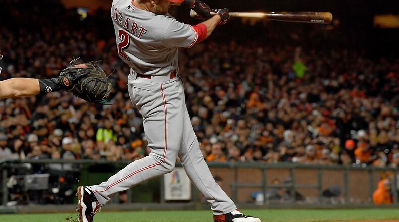SAN FRANCISCO, CA - MAY 11: Zack Cozart #2 of the Cincinnati Reds hits an rbi double scoring Scooter Gennett #4 against the San Francisco Giants in the top of the eighth inning at AT&T Park on May 11, 2017 in San Francisco, California. (Photo by Thearon W. Henderson/Getty Images)