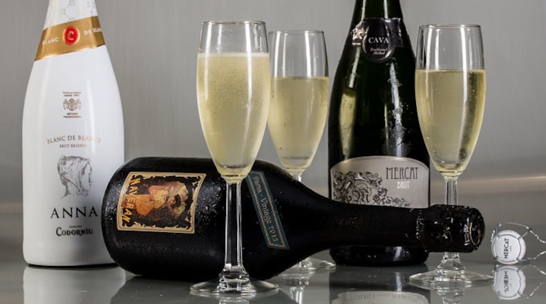 Recommended cavas include Anna de Codorniu Blanc de Blancs Brut Reserva Cava, from left, 2013 Naveran Dama Brut Cava and Mercat Brut Cava. (Zbigniew Bzdak/Chicago Tribune/TNS)