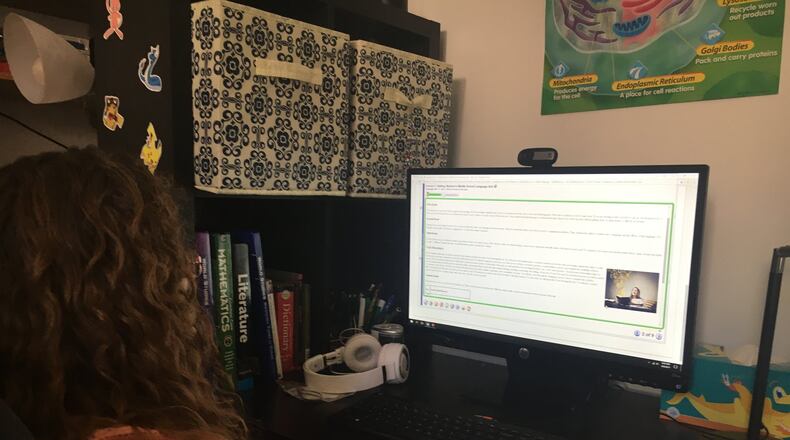 Online schools recommend that students have a dedicated workspace and build a schedule to get their assignments done. JEREMY P. KELLEY / STAFF