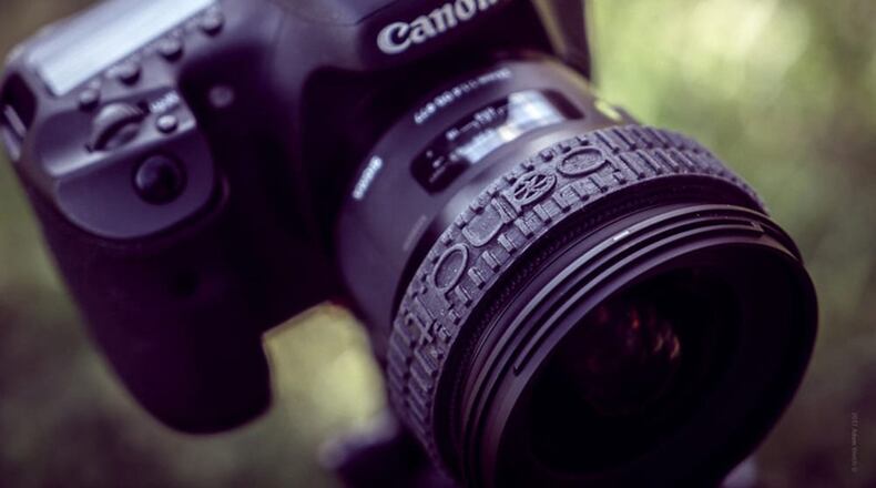 Band.it is a soft, ridged elastomer band that stretches over most interchangeable camera lens and is universal to fit lenses from just about every manufacturer. (Handout/TNS)