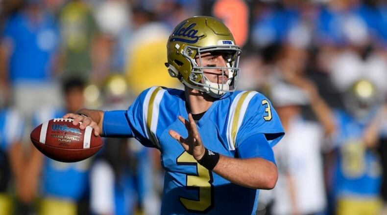 FILE - In this Sept. 10, 2016, file photo, UCLA quarterback Josh Rosen passes during the first half of a college football game against UNLV in Pasadena, Calif. The touted passer missed half of his sophomore season with injuries. With Jedd Fisch becoming his third offensive coordinator in three years, he could swiftly return his NFL draft stock to its former heights. (AP Photo/Mark J. Terrill, File)