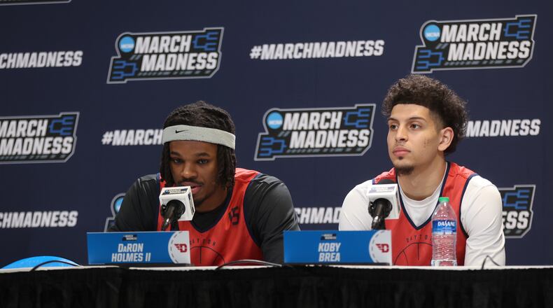 Dayton's DaRon Holmes and Koby Brea appear at a press conference on Friday, March 22, 2024, at the Delta Center in Salt Lake City, Utah. David Jablonski/Staff