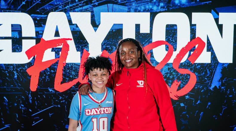 Jordyn Poole, left, poses for a photo with Dayton coach Tamika Williams-Jeter in April 2025. Photo courtesy of UD