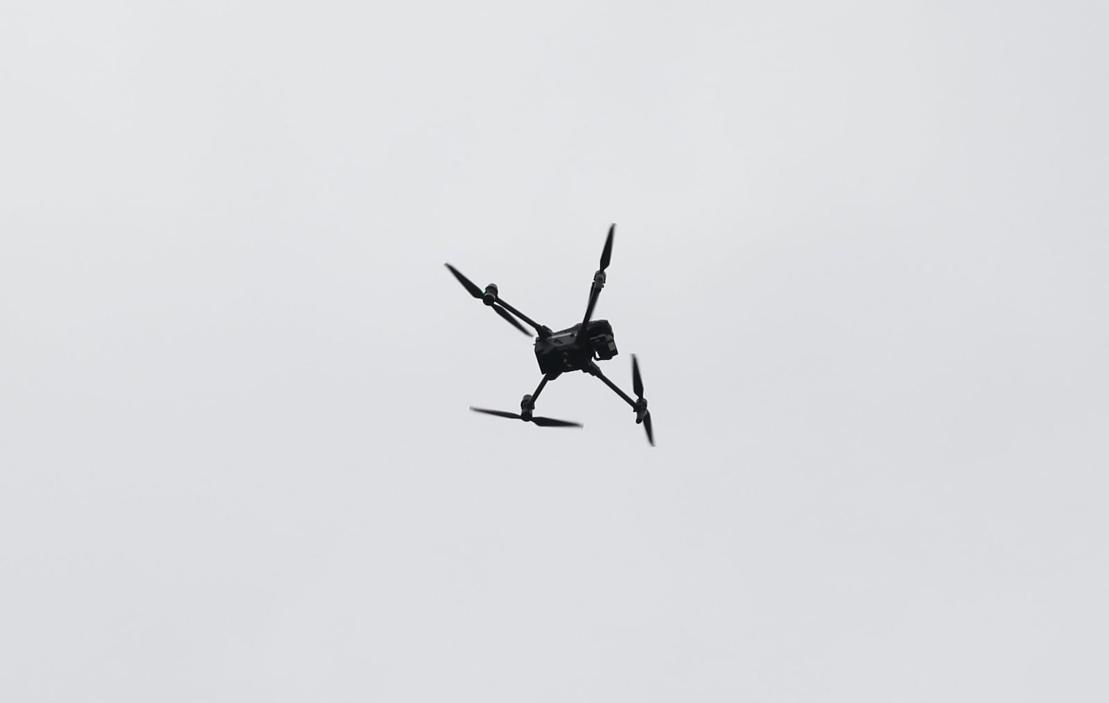 Police fly a drone in a security zone in downtown Dayton during the NATO Parliamentary Assembly in May 2025. NICK GRAHAM/STAFF