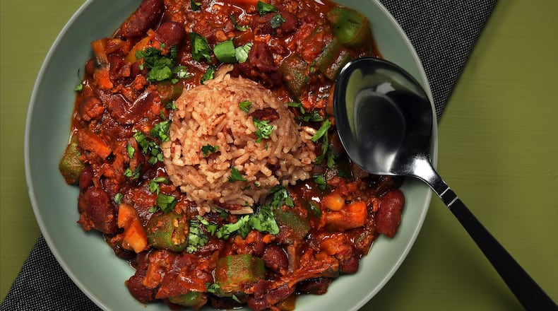 The red beans and chorizo stew tastes great topped with a scoop of red rice. Okra gives the stew additional texture. (Shannon Kinsella/food styling) (Terrence Antonio James/Chicago Tribune/TNS)
