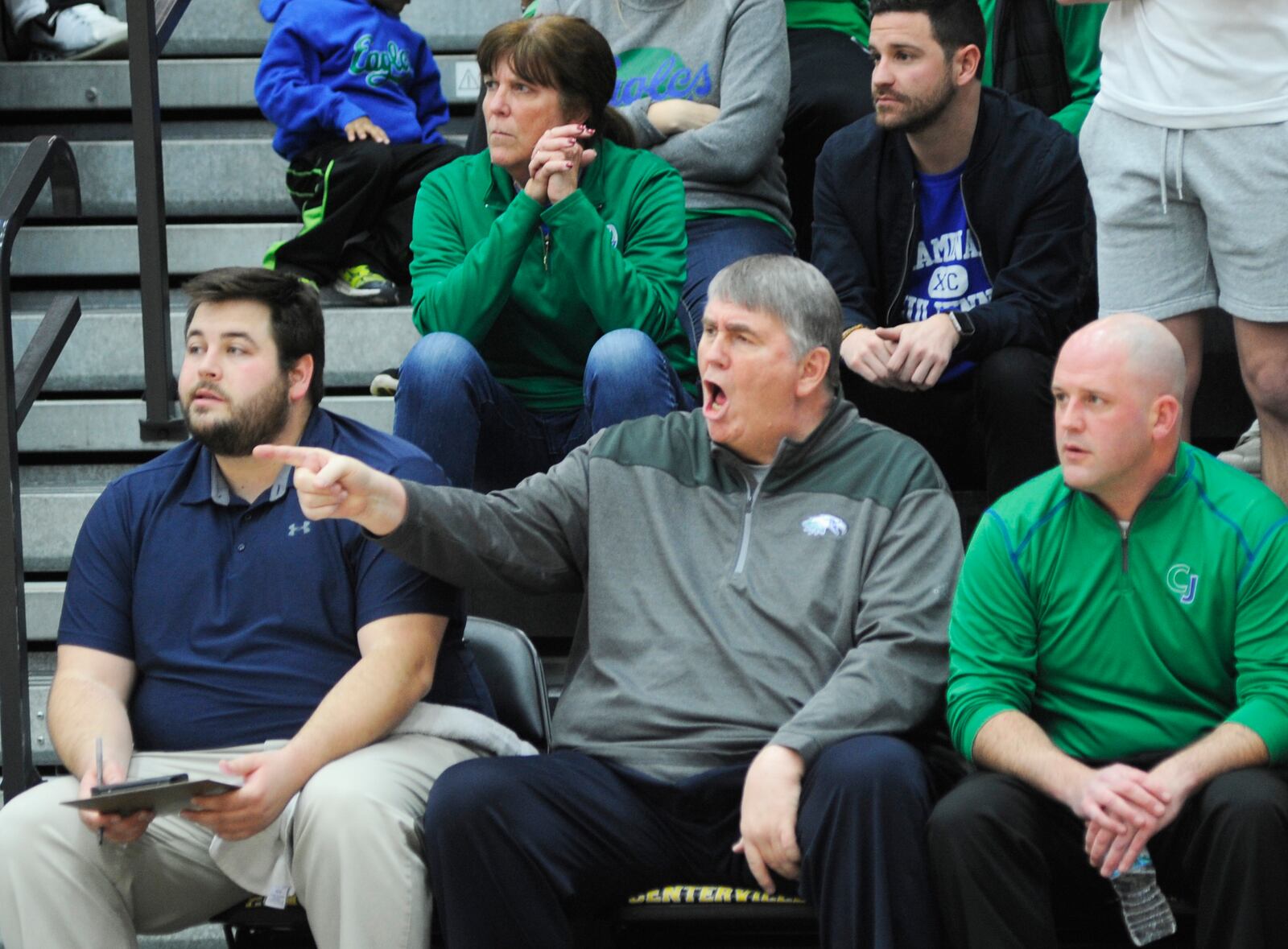 Ann Szabo sits in her familiar spot behind the Chaminade Julienne bench during a game in the 2018-19 season. Current head coach Charlie Szabo is on the right. MARC PENDLETON / STAFF