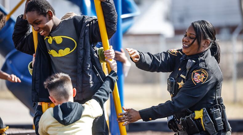 Deputy Melanie Spencer is a Community Gem being recognized for her role as a school resource officer at Blairwood Elementary. JIM NOELKER/STAFF