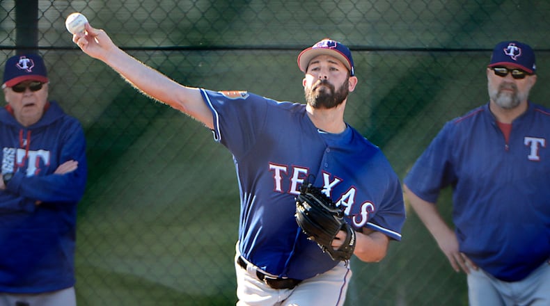 Texas Rangers relief pitcher Mike Hauschild (49) throws a bullpen session during practice at Rangers spring training on Monday, Feb. 20, 2017 in Surprise, Ariz. (Max Faulkner/Fort Worth Star-Telegram/TNS)
