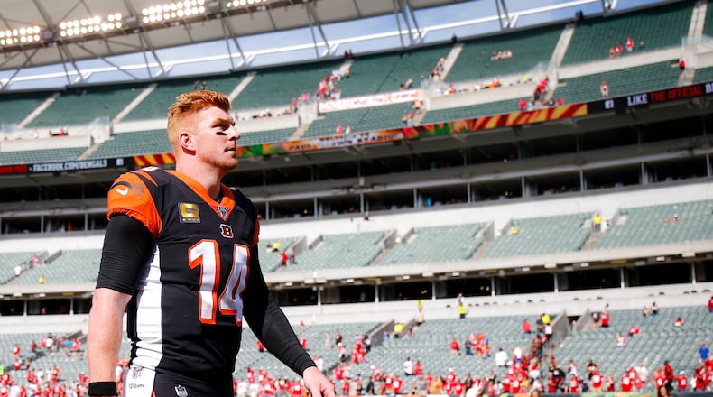 Cincinnati Bengals quarterback Andy Dalton walks off the field after an NFL football game against the San Francisco 49ers, Sunday, Sept. 15, 2019, in Cincinnati. (AP Photo/Gary Landers)