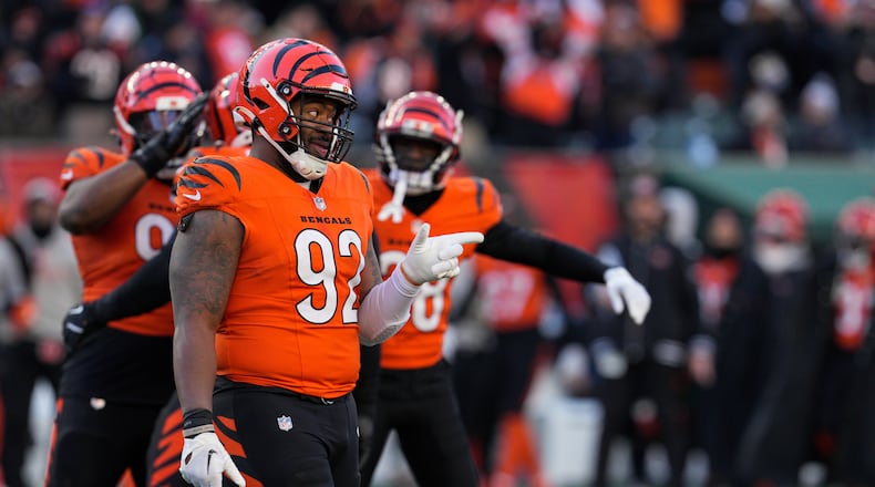 Cincinnati Bengals defensive tackle B.J. Hill (92) reacts after defensive end Joseph Ossai blocked a field goal against the Pittsburgh Steelers during the second half of an NFL football game, Sunday, Dec. 1, 2024, in Cincinnati. (AP Photo/Jeff Dean)
