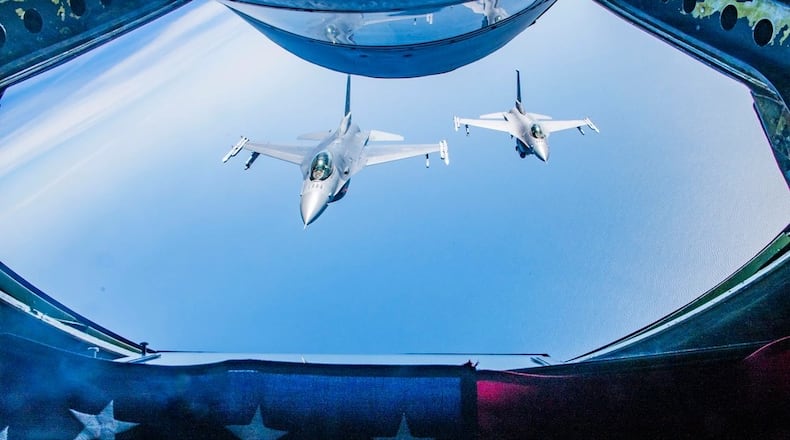 Two F-16 Fighting Falcons with the 113th Wing fly behind a KC-135 Stratotanker from the 121st Air Refueling Wing after being refueled over the Atlantic Ocean, March 12, 2024. (U.S. Air National Guard photo by Senior Airman Ivy Thomas)