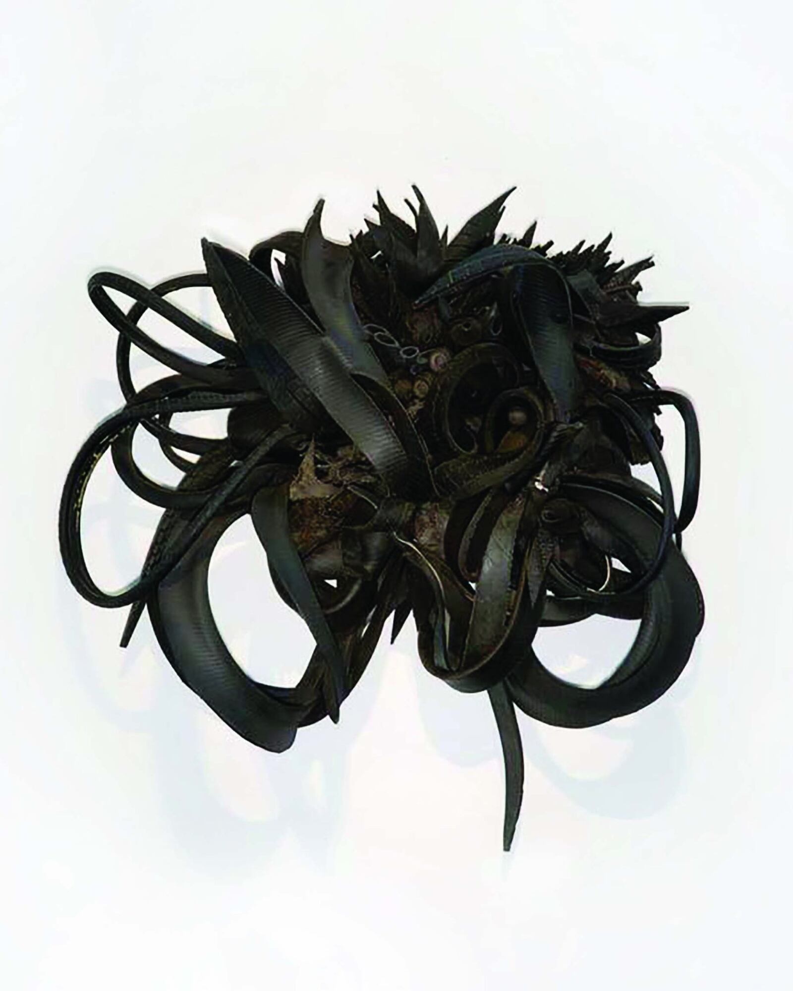 "Urban Butterfly," a 2002 piece by Chakaia Booker, is made of rubber tires and wood. It is part of the "Riveting" exhibit at the Dayton Art Institute, courtesy of the Sara W. and Michelle Vance Waddell Collection. CONTRIBUTED/DAI